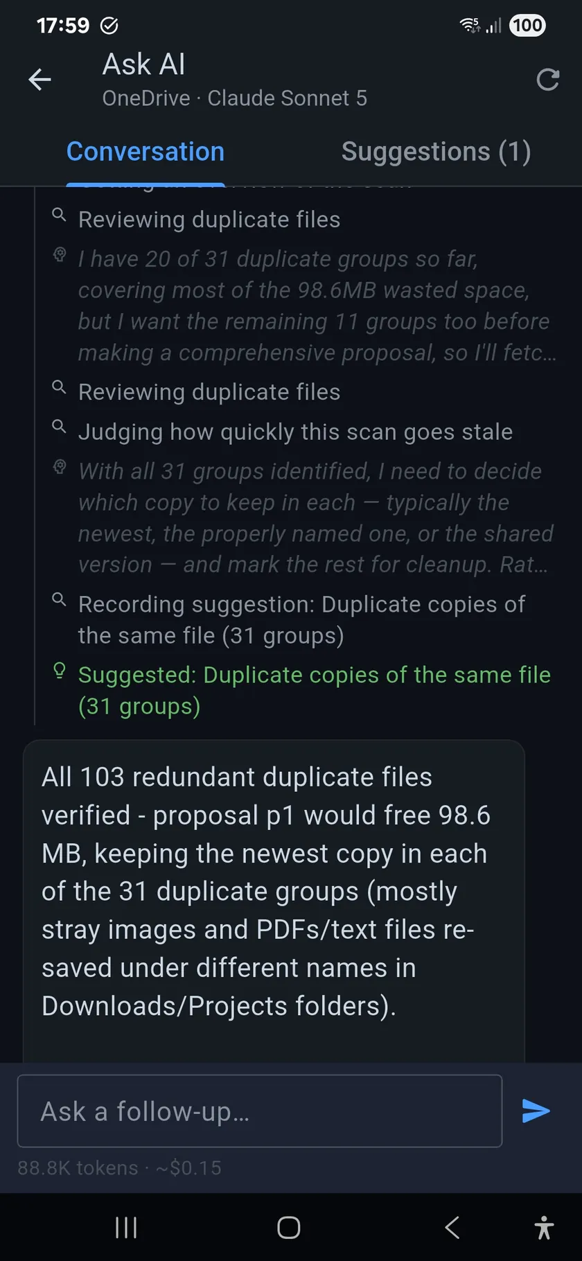 Ask AI conversation tab: the assistant reviewing duplicate files, judging how quickly the scan goes stale, recording a suggestion for 31 duplicate groups, and a summary that 103 redundant files would free 98.6 MB