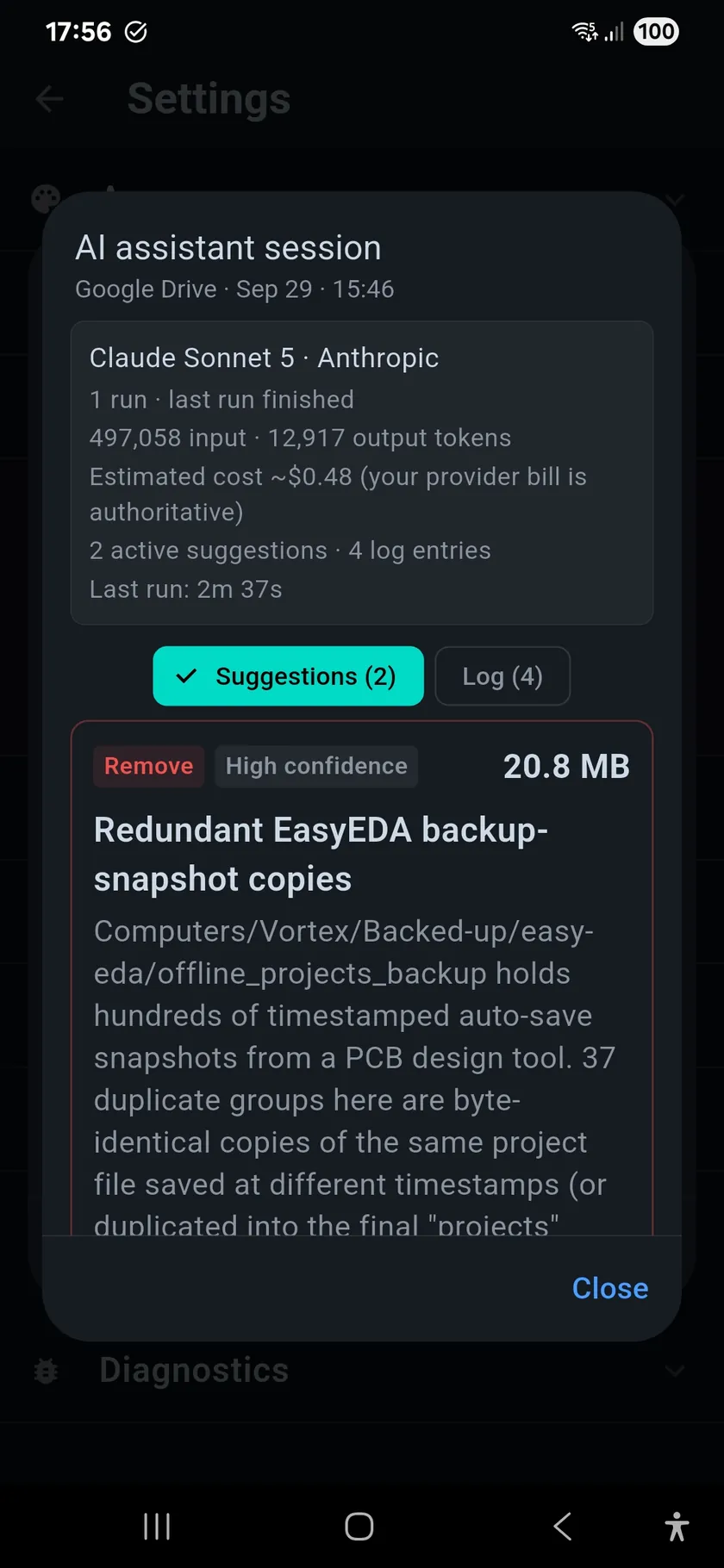 Action history entry for an AI assistant session on Google Drive: Claude Sonnet 5, one run, input and output tokens, estimated cost of about $0.48, two active suggestions and four log entries